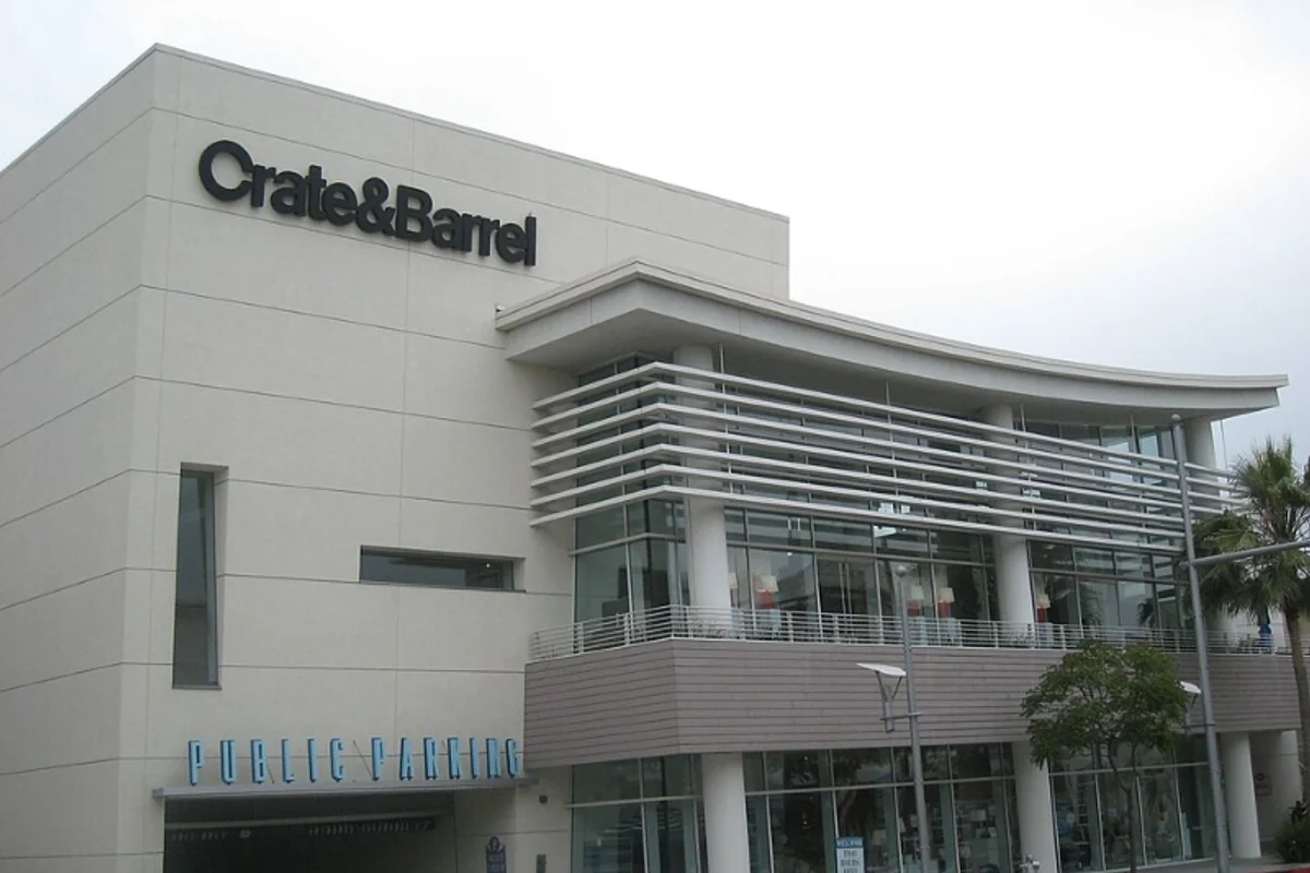 Crate and Barrel logo showing Helvetica Bold with the distinctive circular C character