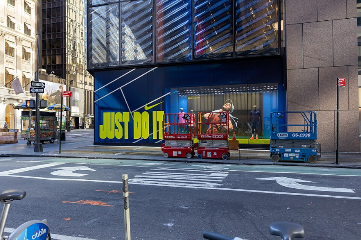 Nike wordmark in modified Futura Condensed Extra Black alongside the Swoosh